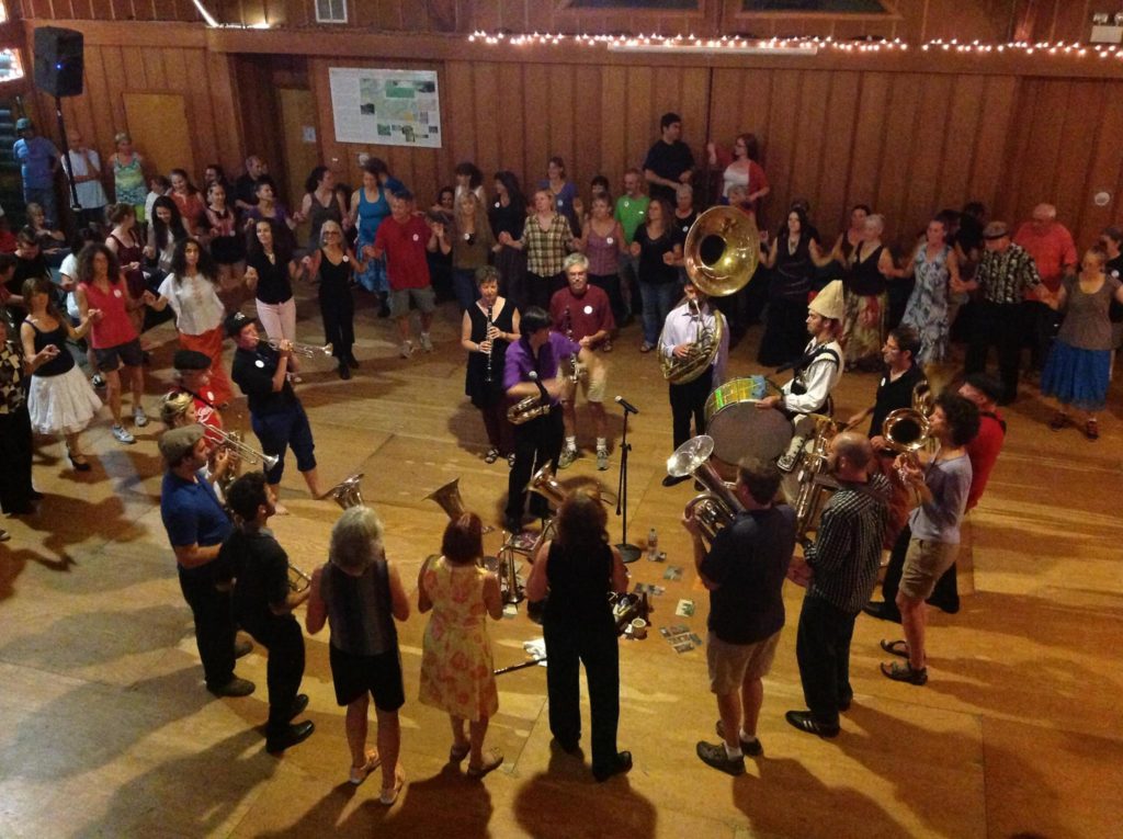 A brass band plays in the middle of the dance floor at Balkanalia music camp