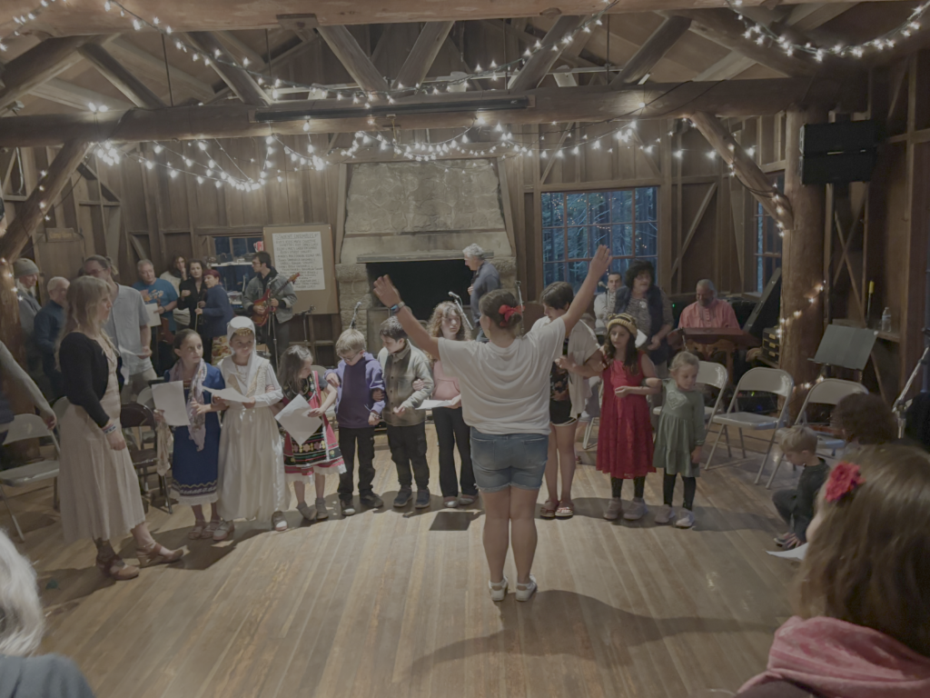 Janetta Redzic directs the kids dance at Mendocino Balkan Camp